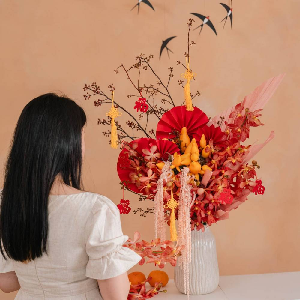 close-up-red-orchid-chinese-new-year-flower-arrangement